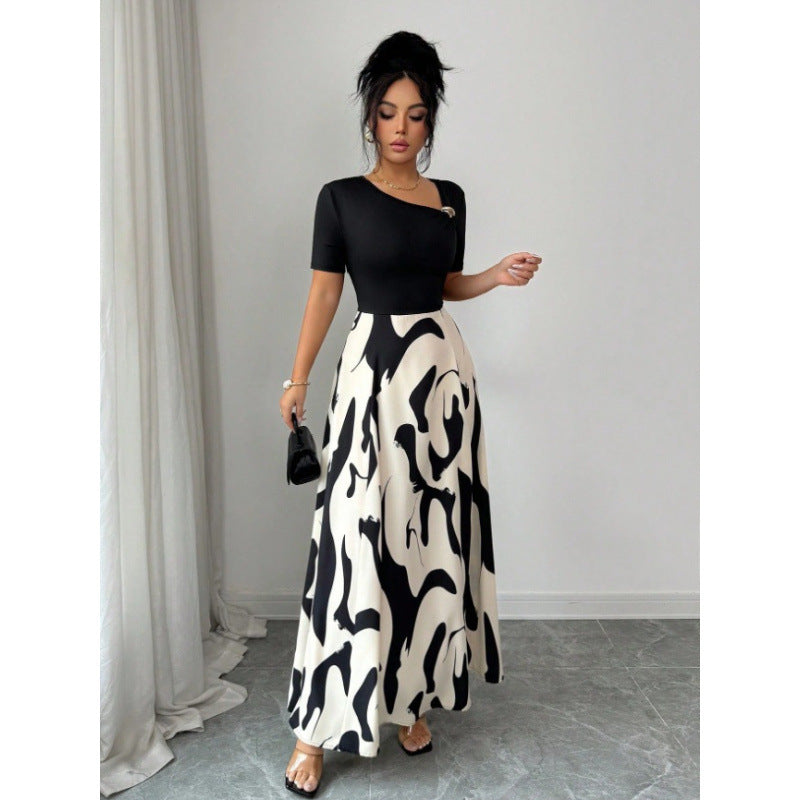 Robe longue bicolore, haut uni et jupe imprimée