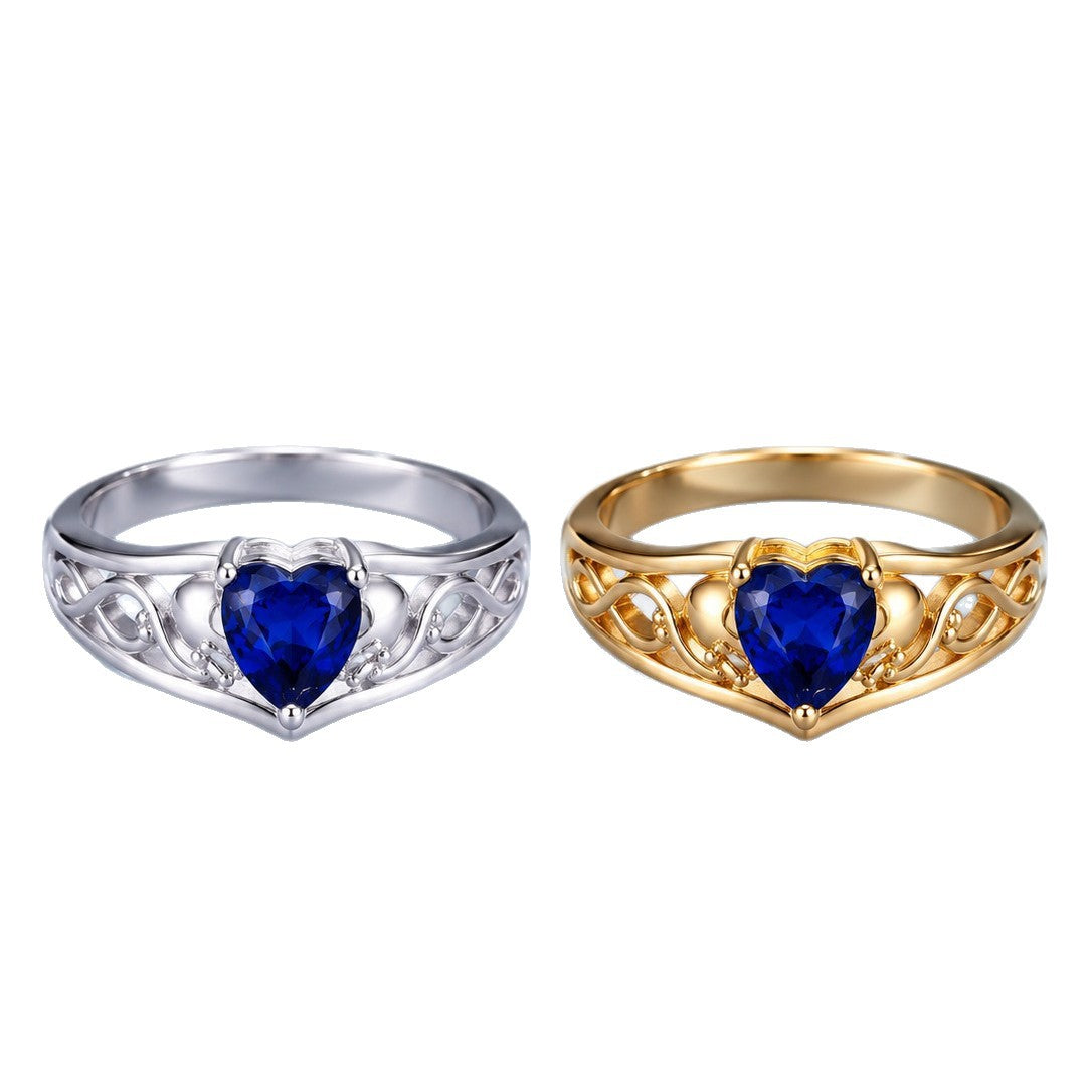 Bague mains en cœur en acier titane — geste stylisé