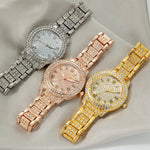 Montre femme pavée de strass, cadran étoilé et bracelet métal