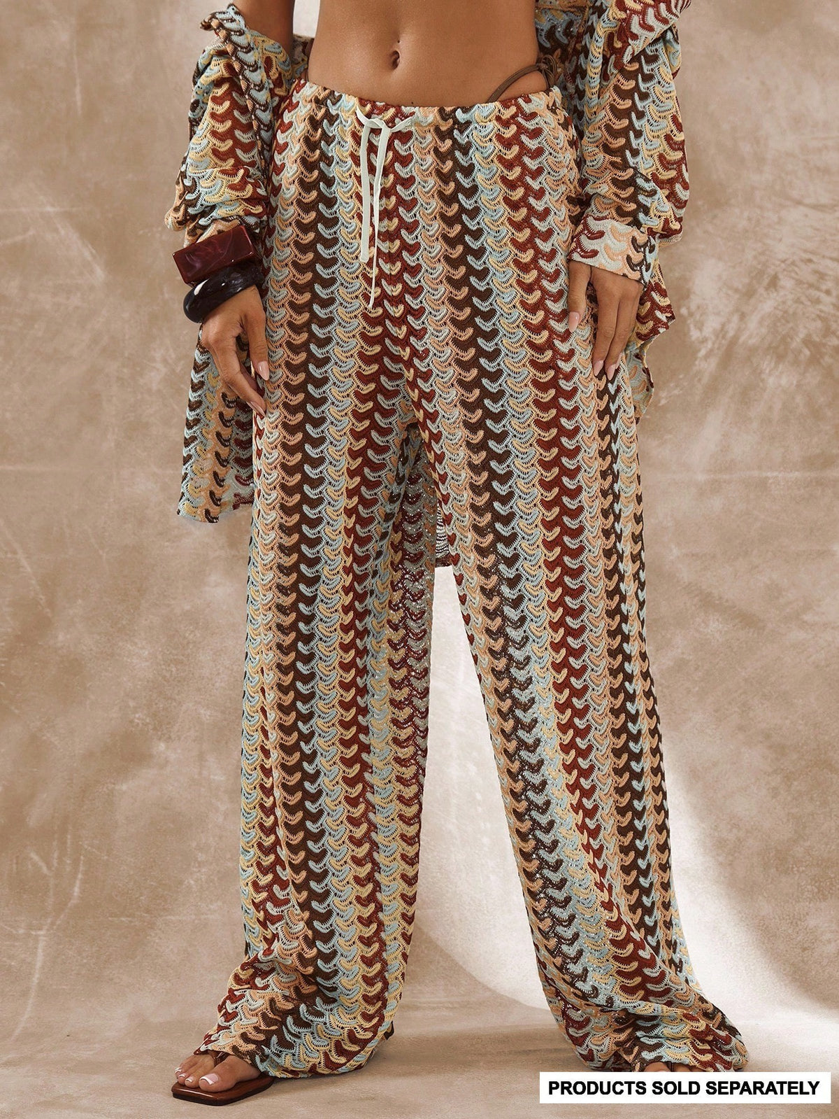 Pantalon de plage en maille crochet ajourée — motif vagues — coloris