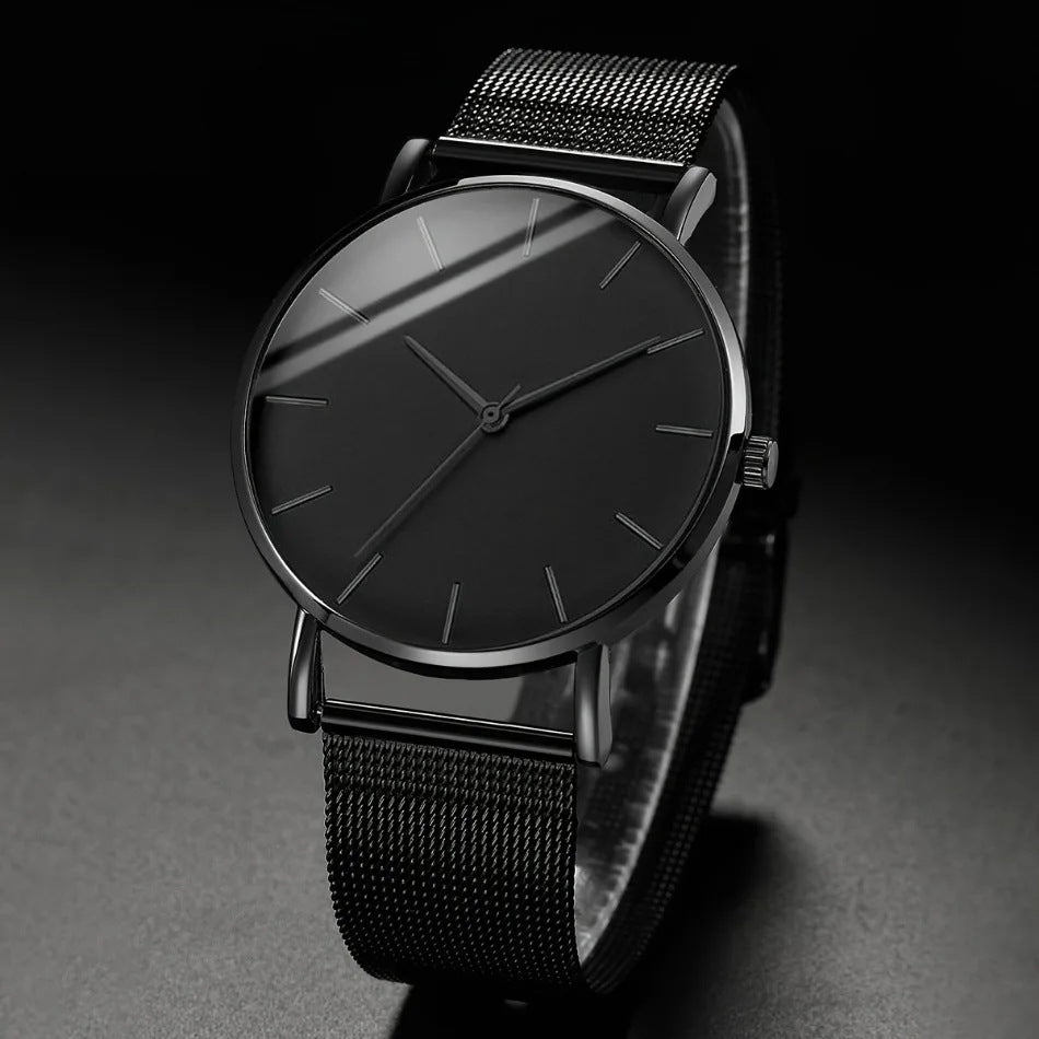 Montre homme noire ultra-fine, bracelet milanais