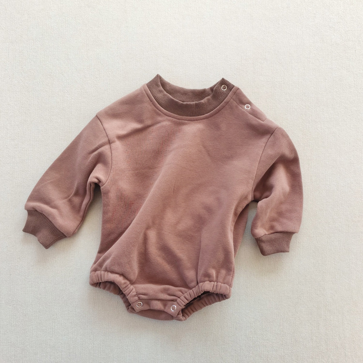 Combinaison bébé unie en coton — manches longues