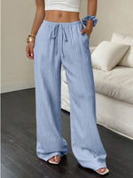 Pantalon large en gaze froissée, taille à cordon