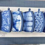 Porte-monnaie en toile teinte indigo — motif noué à la main