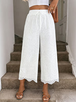 Pantalon large en broderie anglaise — blanc, ourlet festonné
