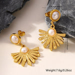 Boucles d’oreilles pendantes soleil — acier doré