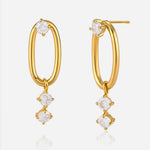 Boucles d’oreilles ovales dorées serties de zircon blanc
