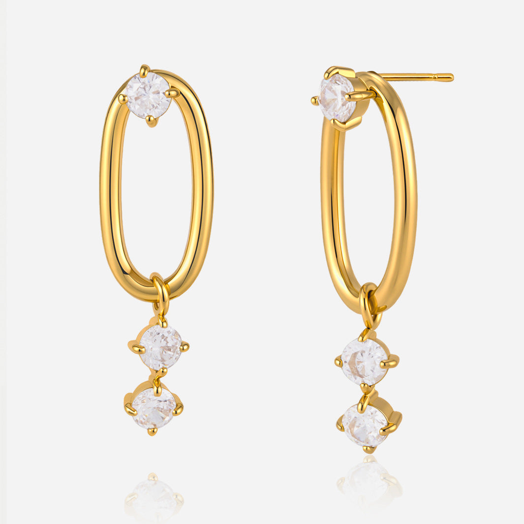 Boucles d’oreilles ovales dorées serties de zircon blanc