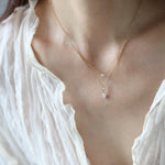 Collier double rang doré — petit zircon et goutte suspendue