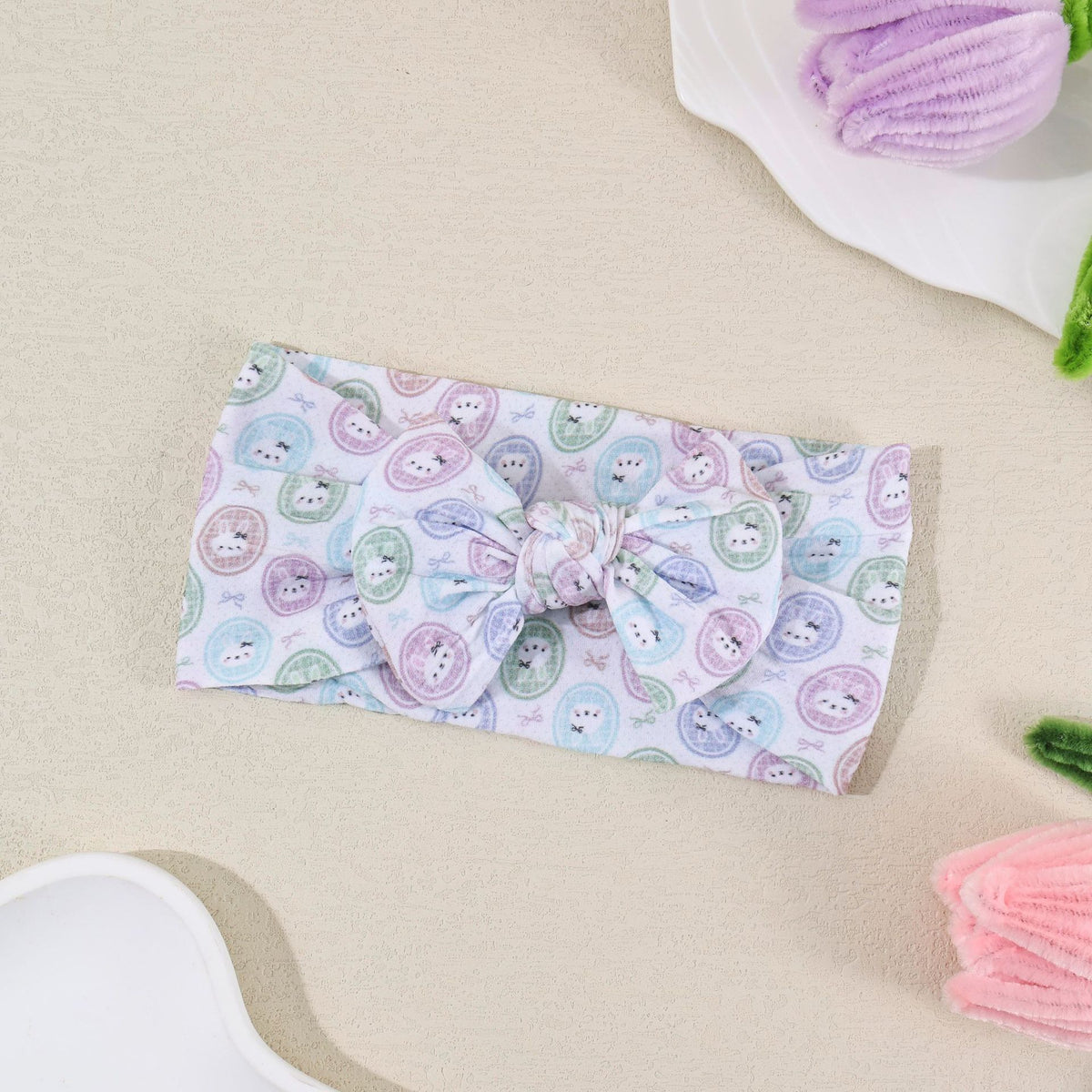 Bandeau bébé à nœud en nylon souple — 16 × 8 cm — coloris