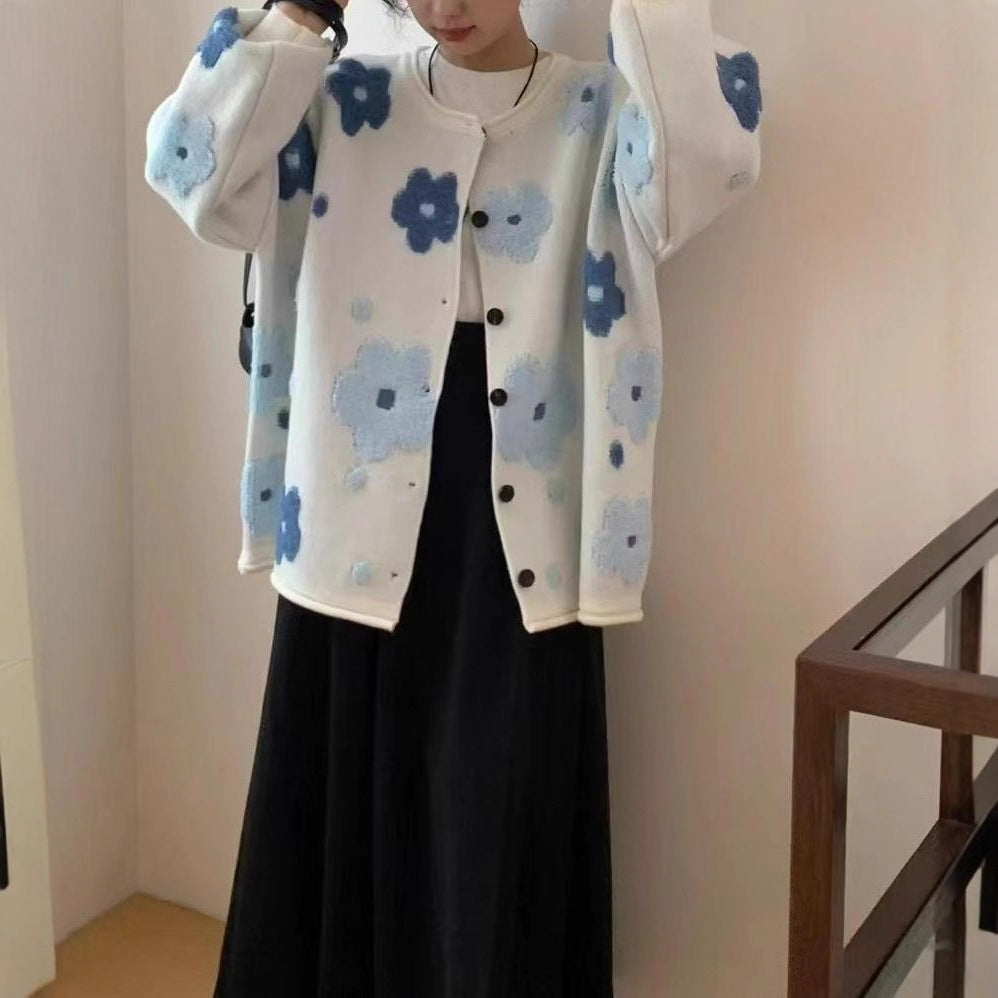 Gilet ample en maille bouclée à fleurs