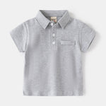 Polo garçon en coton — manches courtes, col boutonné — coloris