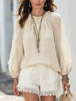 Blouse à manches lanternes, encolure à lien