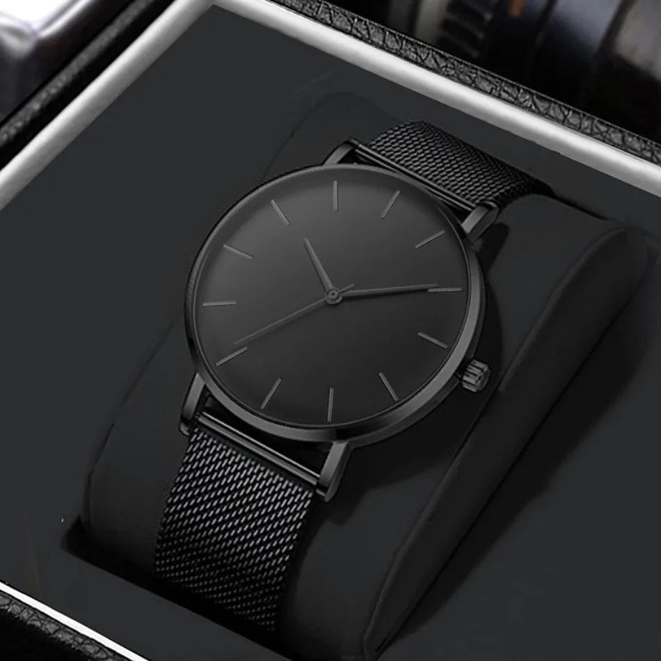 Montre homme noire ultra-fine, bracelet milanais