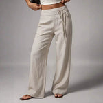Pantalon large taille haute, ceinture à nouer