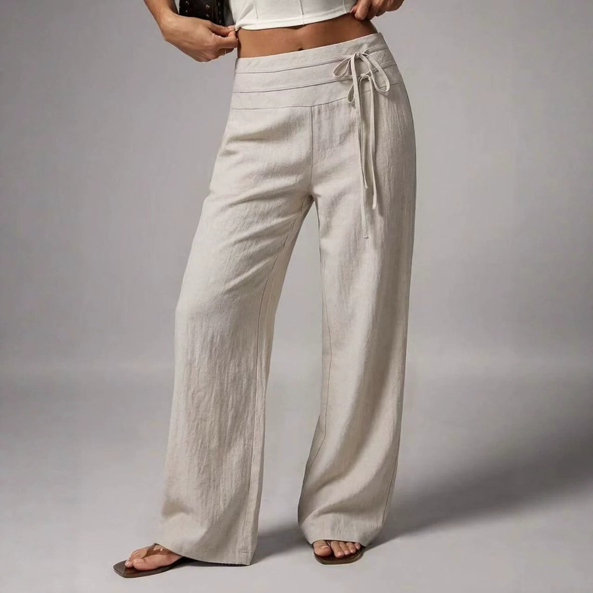 Pantalon large taille haute, ceinture à nouer
