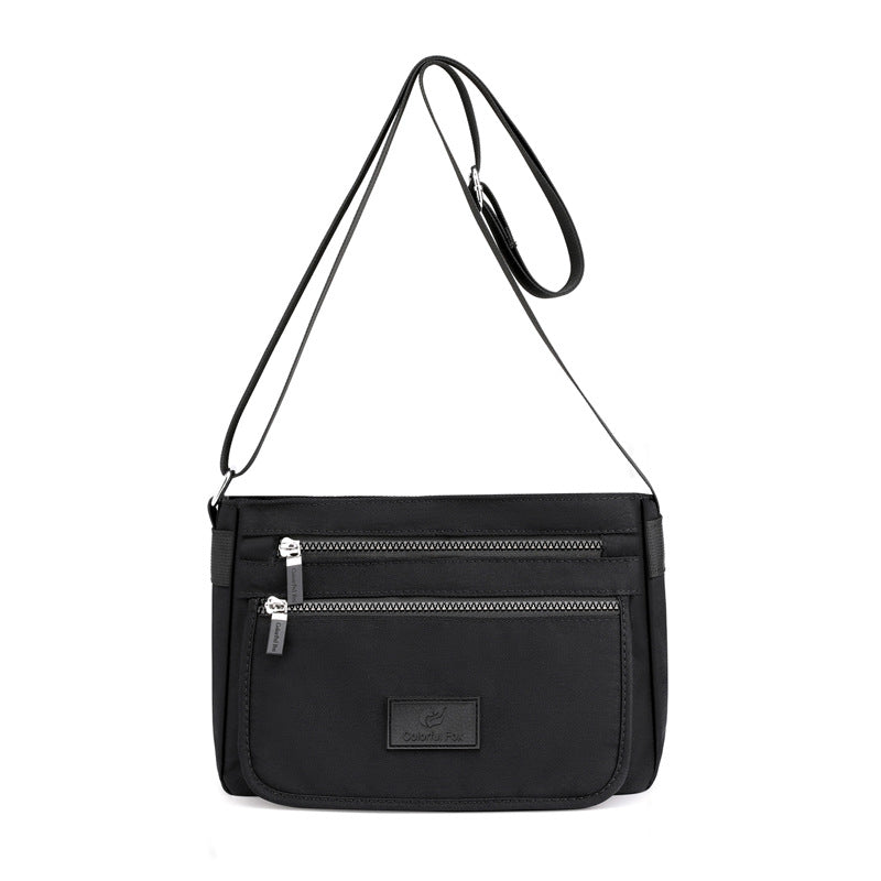 Sac femme à ligne structurée — anse courte et bandoulière — coloris