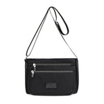 Sac femme à ligne structurée — anse courte et bandoulière — coloris