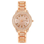 Montre femme pavée de strass, cadran étoilé et bracelet métal