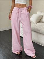Pantalon large en gaze froissée, taille à cordon