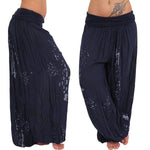 Pantalon sarouel fluide à imprimé moucheté — taille smockée