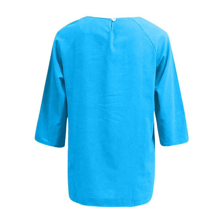 Blouse ample à col rond et manches trois-quarts — coupe trap — coloris