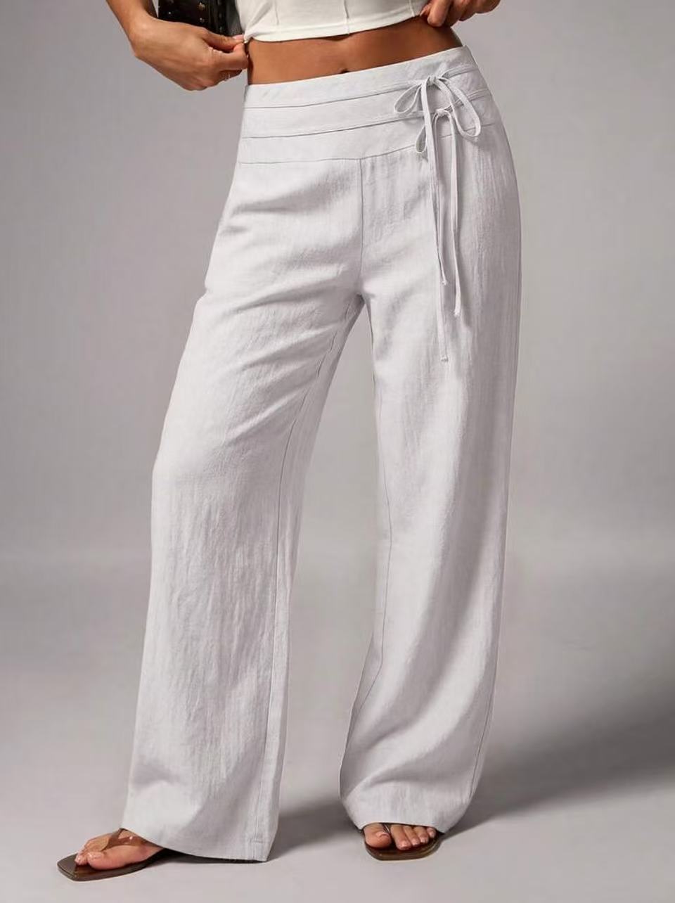 Pantalon large taille haute, ceinture à nouer