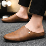 Mules homme aspect cuir lisse — bout rond, se chaussent sans les mains