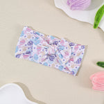Bandeau bébé à nœud en nylon souple — 16 × 8 cm — coloris