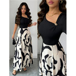 Robe longue bicolore, haut uni et jupe imprimée