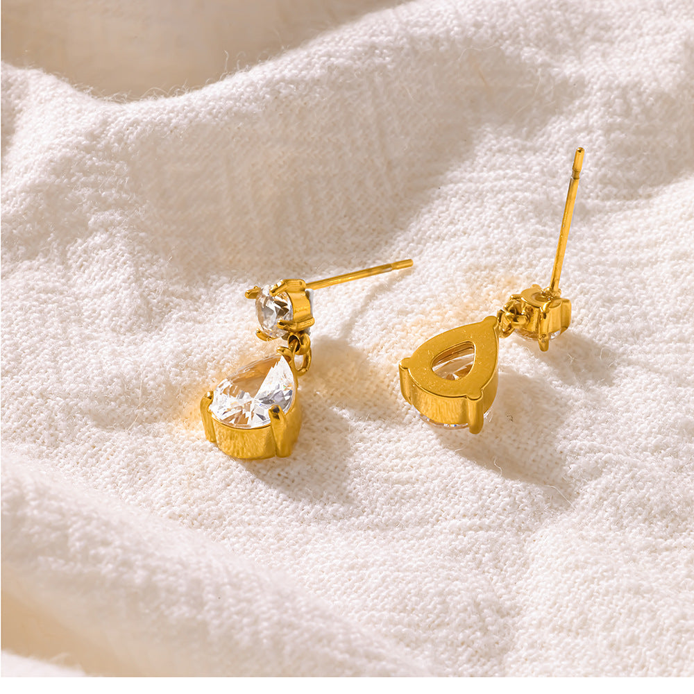 Boucles d’oreilles dorées à goutte de zircon — puce et pendant