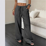 Pantalon large en gaze froissée, taille à cordon — coloris
