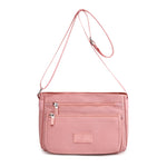Sac femme à ligne structurée — anse courte et bandoulière — coloris
