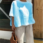 Blouse ample à col rond et manches trois-quarts — coupe trap — coloris
