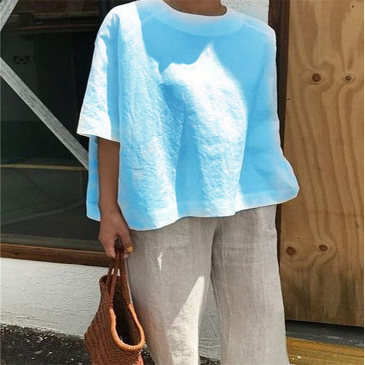 Blouse ample à col rond et manches trois-quarts — coupe trap — coloris