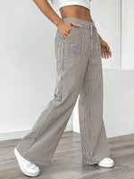 Pantalon large à fines rayures, taille élastiquée à cordon — coloris