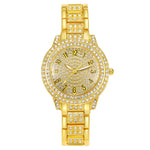 Montre femme pavée de strass, cadran étoilé et bracelet méta — coloris