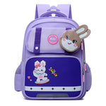 Cartable primaire à écusson animal — lapin ou dinosaure — coloris