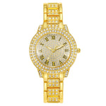 Montre femme pavée de strass, cadran étoilé et bracelet métal