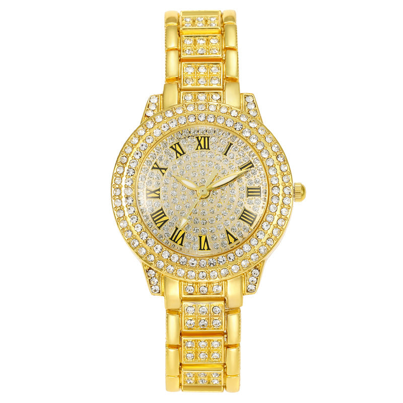 Montre femme pavée de strass, cadran étoilé et bracelet métal