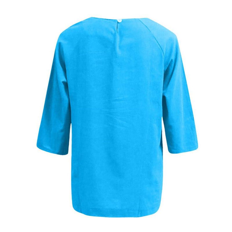 Blusa amplia de cuello redondo y manga tres cuartos — corte trapecio — color