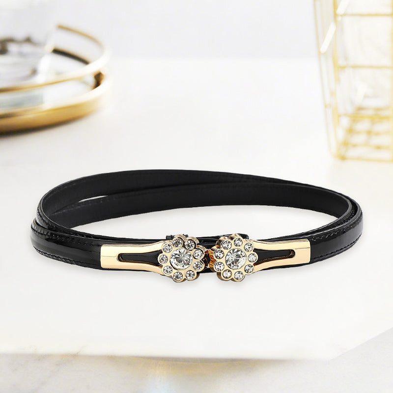 Cinto fino com flor cravejada de strass — regulável