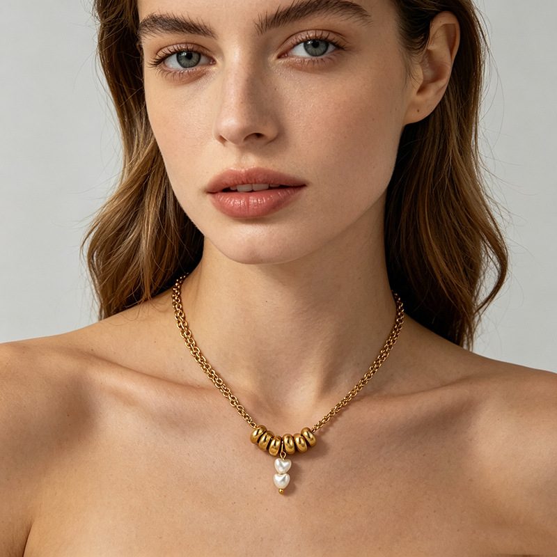 Collier doré à anneaux bombés et perles — double chaîne, acier inoxydable