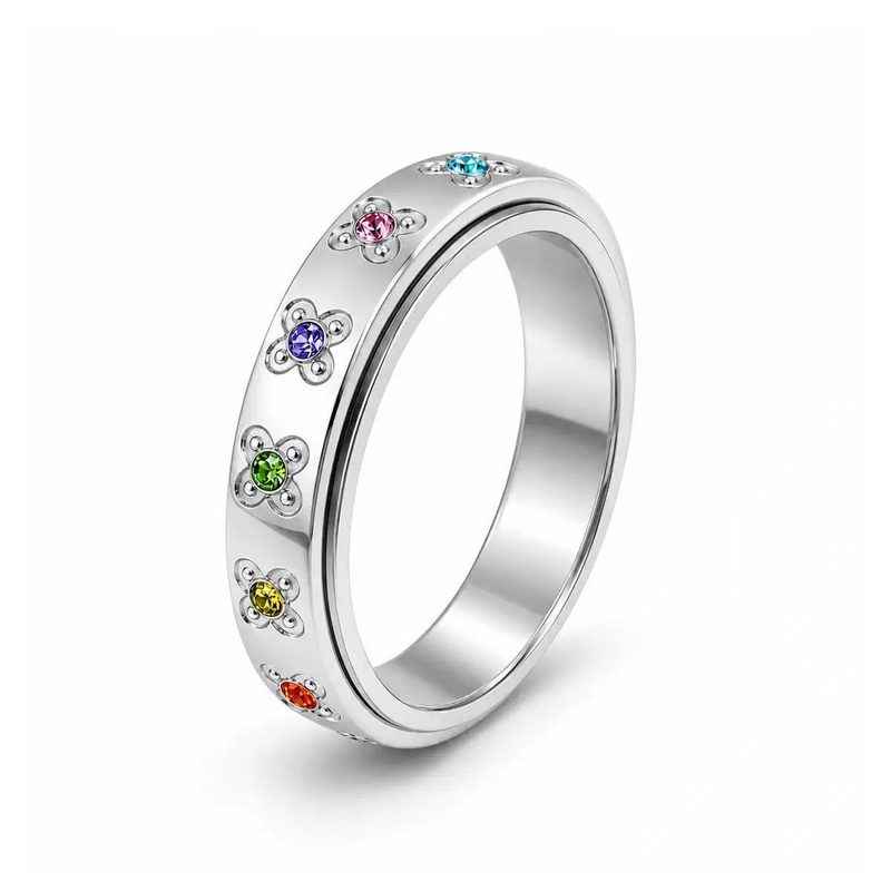 Bague à anneau tournant en acier inoxydable — fleurs serties de pierres de couleur