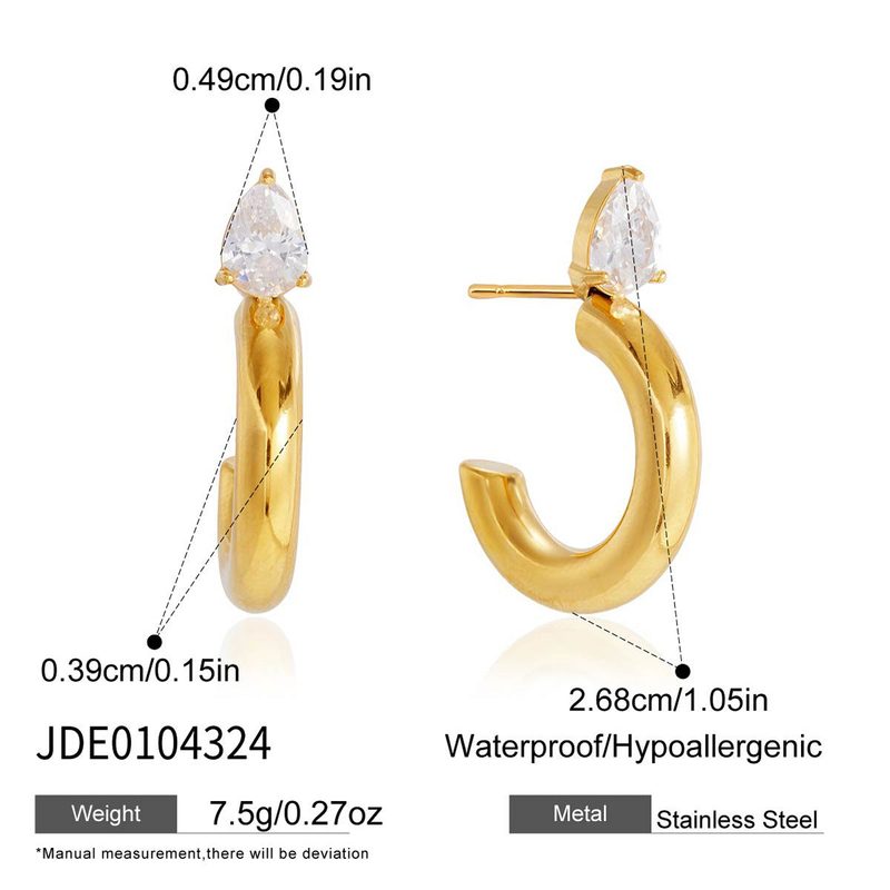 Boucles d’oreilles en C serties de zircons — acier titane