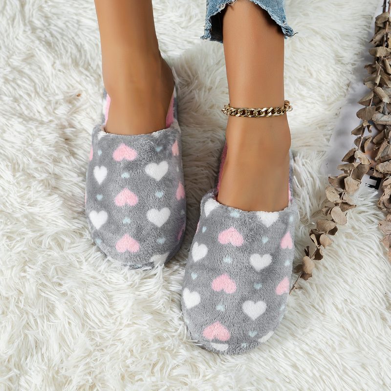 Chaussons femme duveteux à motifs cœurs ou étoiles — semelle antidérapante