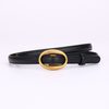Black, gold buckle