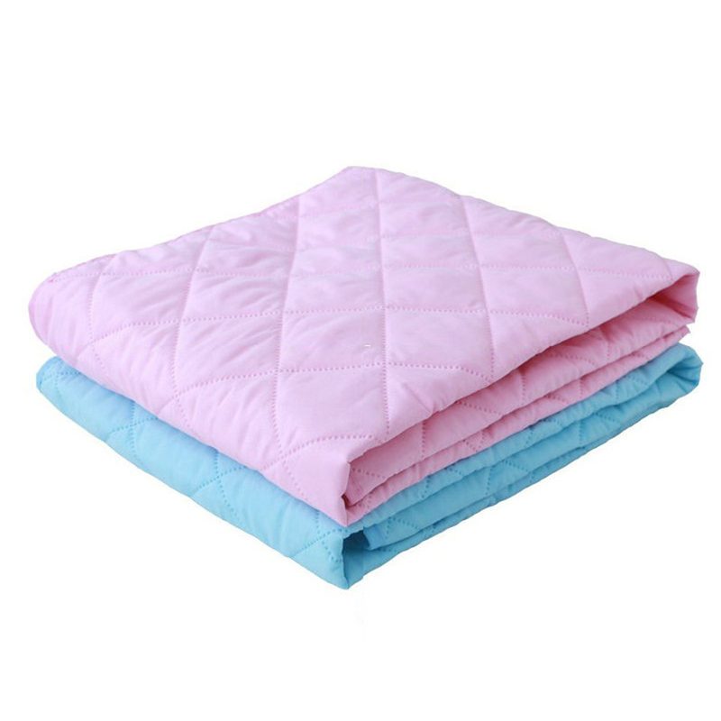 Alèse matelassée imperméable pour le change — rose ou bleu