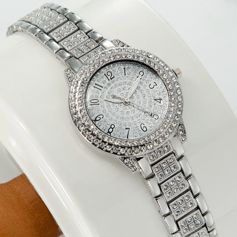 Women's rhinestone-encrusted watch, starry dial and metal bracelet