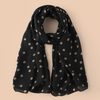 Pois sur fond noir